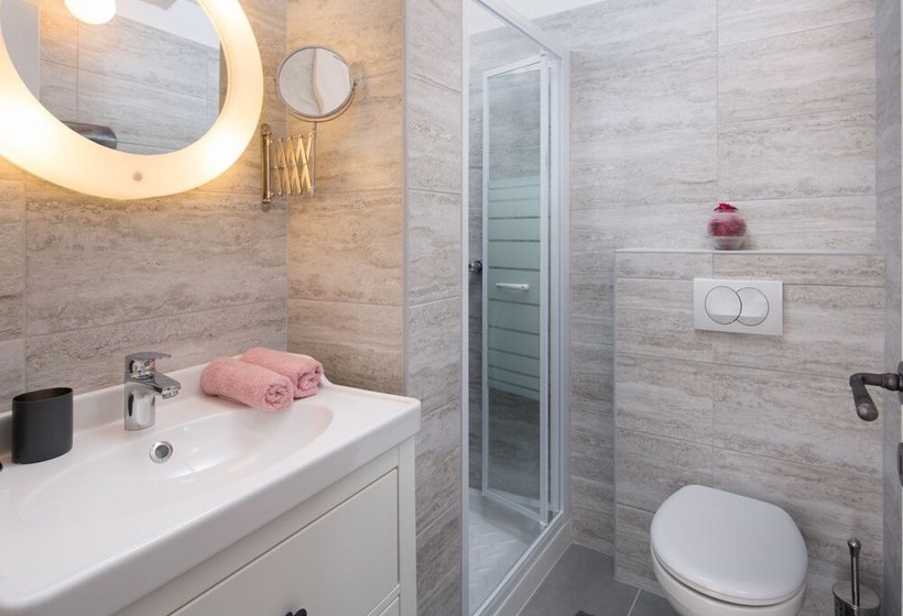 Surrounded By Beautiful Mediterranean Vegetation And The Crystal Clear Sea