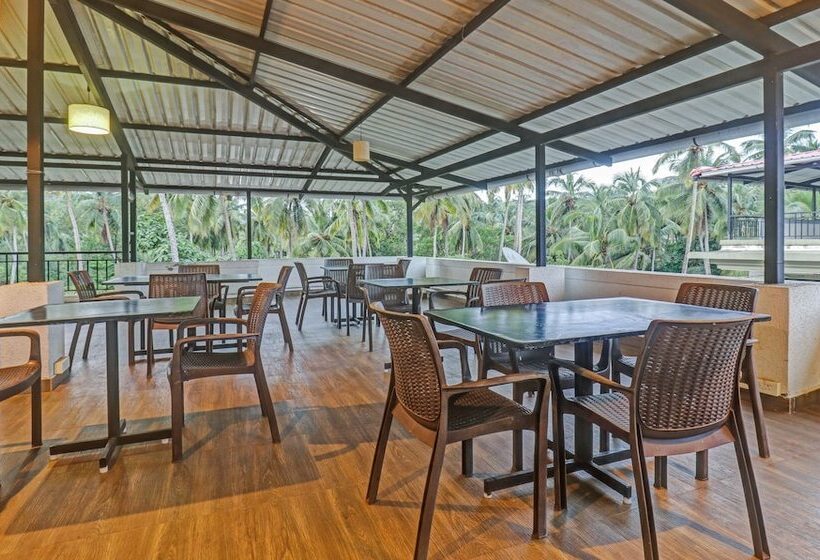 בית מלון כפרי Treebo Aquamarine Arpora