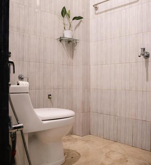 مبيت وإفطار Akim Homestay