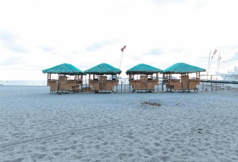 هتل Reddoorz Hostel At Megans Paradisio Beach Resort