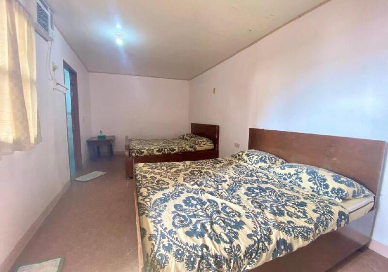 هتل Reddoorz Hostel At Megans Paradisio Beach Resort