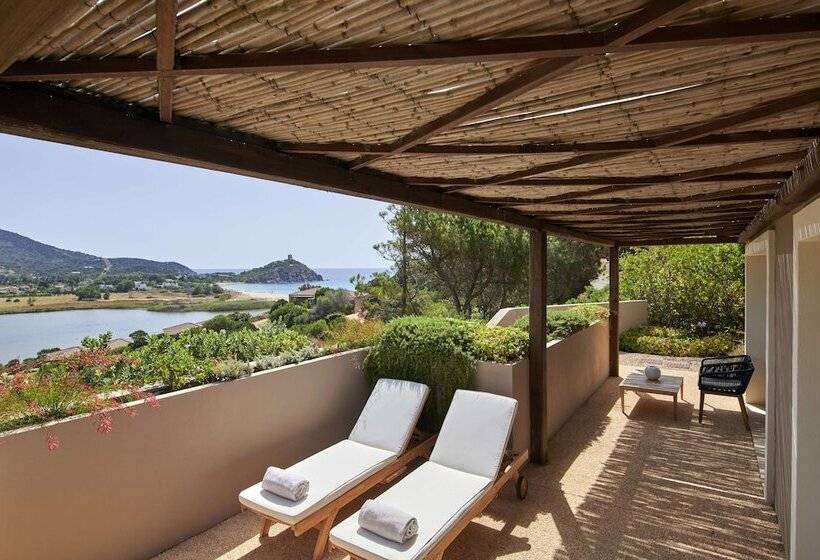 Отель Baia Di Chia Resort Sardinia, Curio Collection By Hilton