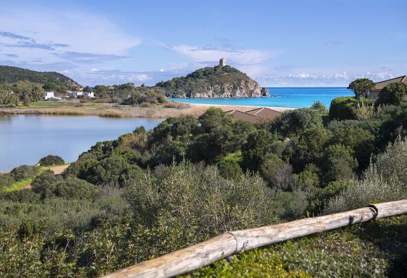 Отель Baia Di Chia Resort Sardinia, Curio Collection By Hilton