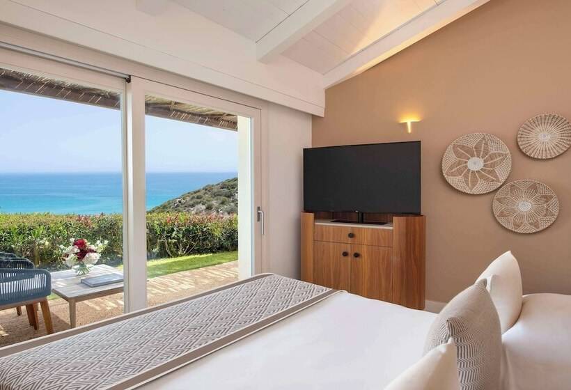 Отель Baia Di Chia Resort Sardinia, Curio Collection By Hilton
