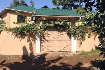 تختخواب و صبحانه Papagei Home