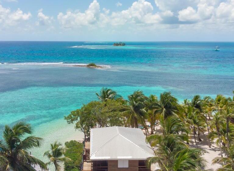 בית מלון כפרי Pelican Beach Resort South Water Caye
