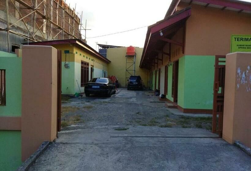 Отель Oyo 90648 Kusnan Guest House