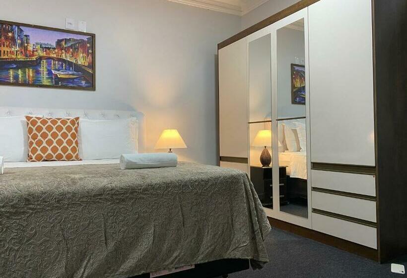 Отель Quarto Luxo Silver