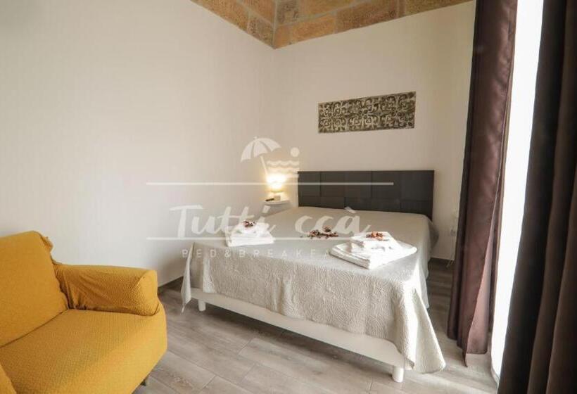 تختخواب و صبحانه Tutti Ccà Airport Rooms