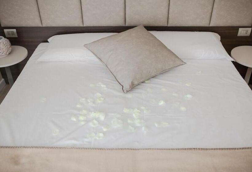 تختخواب و صبحانه Menta E Rosmarino Rooms