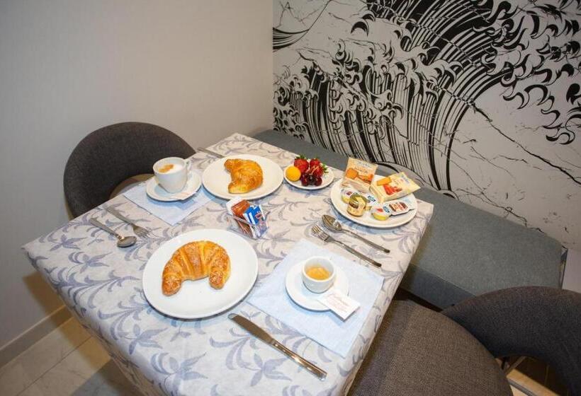 ホテル Odissea Residence E Rooms