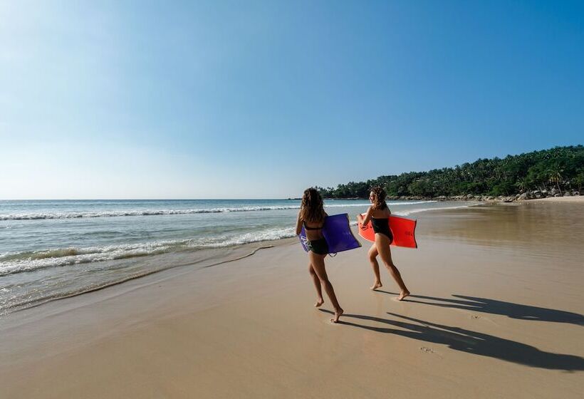 Отель The Surin Phuket