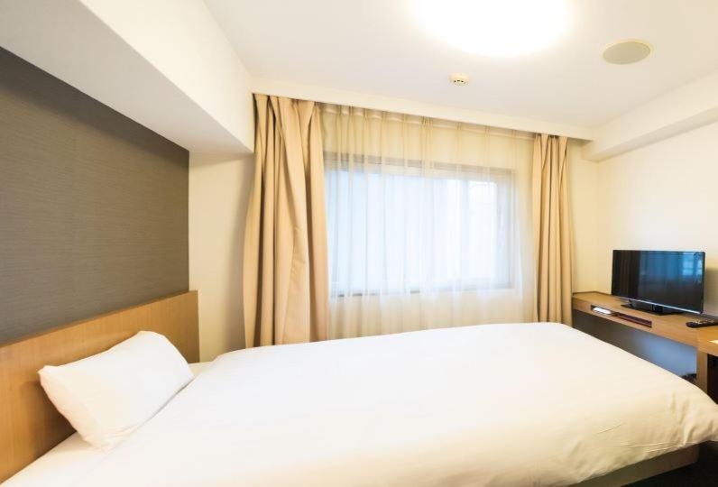 Отель Dormy Inn Umeda Higashi Natural Hot Spring