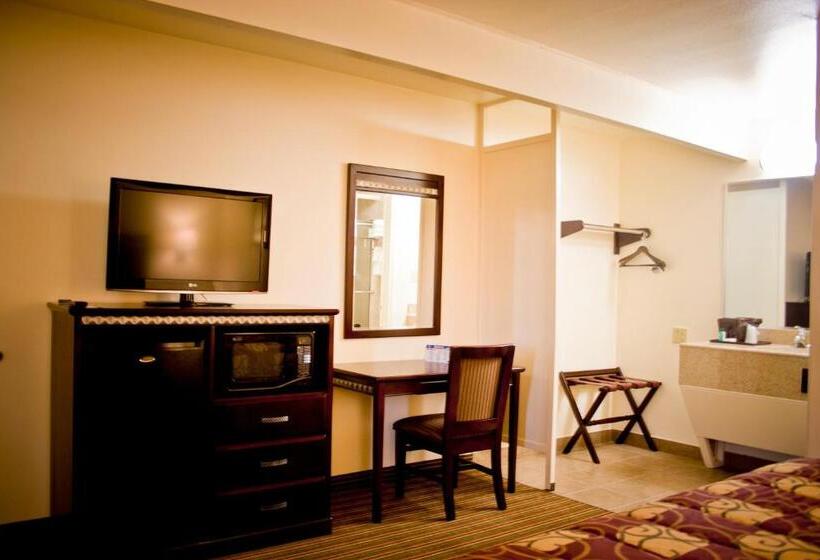 مُتل Whispering Palms Inn