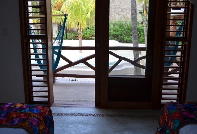 هتل Casa Iguana Holbox   Beachfront