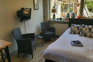 تختخواب و صبحانه Tuinhuis Duinroos Deluxe