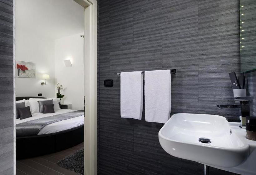 Отель Gregorio Vii Luxury Suites