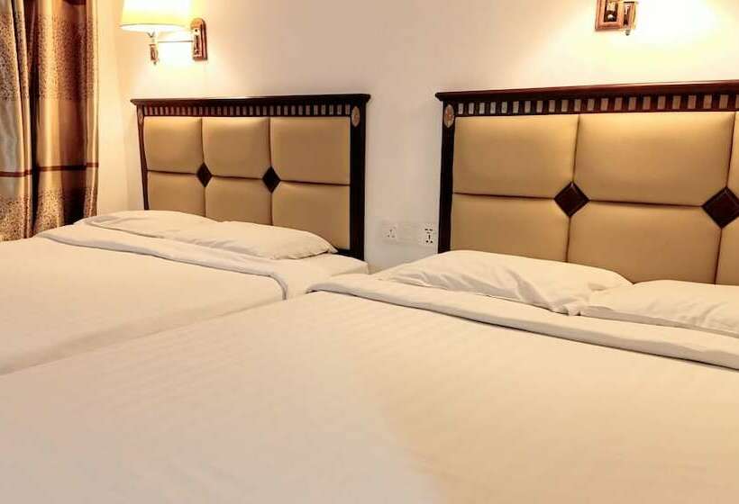 هتل Oyo 90464 Borneo Suites