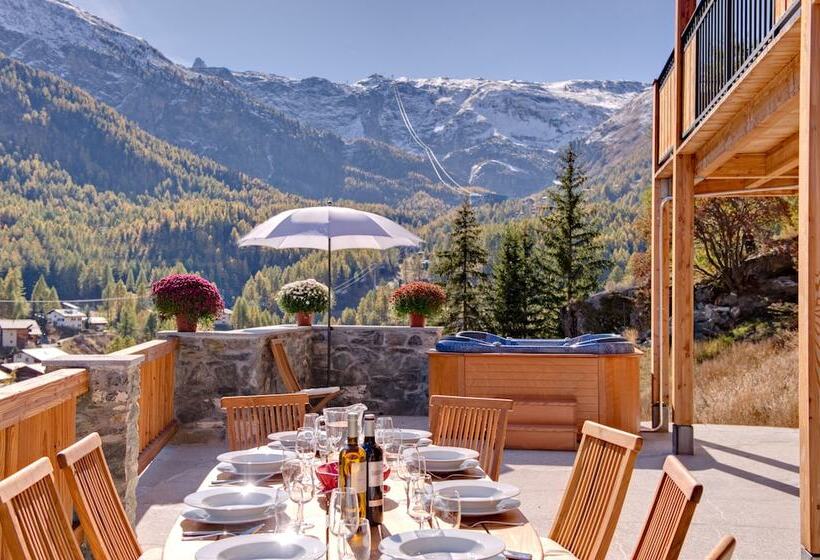 ホテル Mountain Exposure Luxury Chalets & Penthouses & Apartments