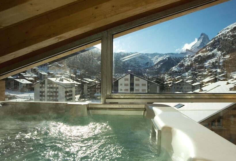 هتل Mountain Exposure Luxury Chalets & Penthouses & Apartments
