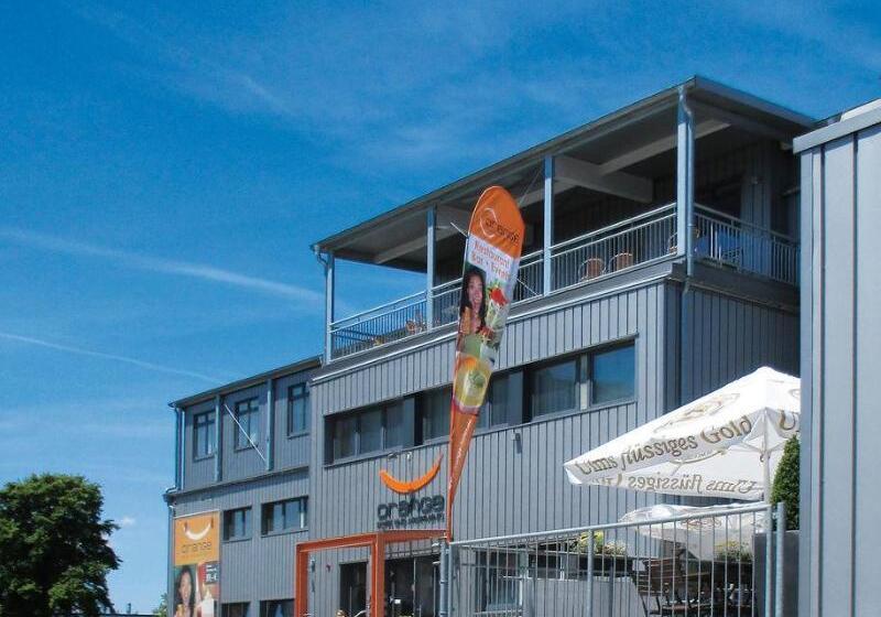 Orange Hotel Und Apartments