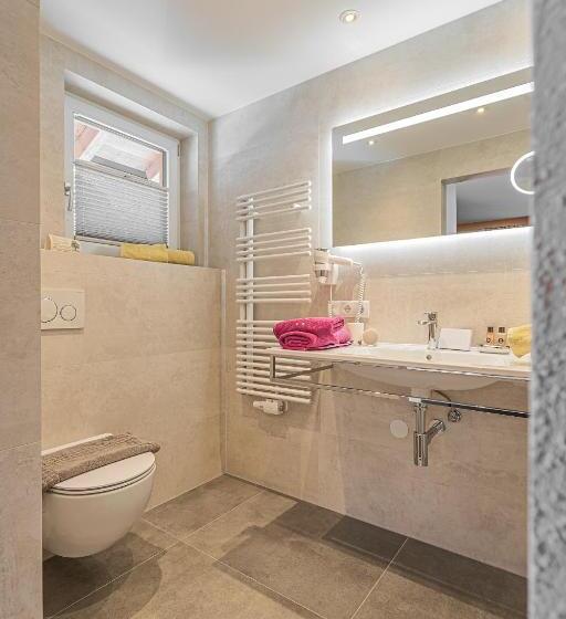 تختخواب و صبحانه Garni Vierjahreszeiten