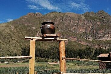 تختخواب و صبحانه Mamá Cocha Pisac Lodge House