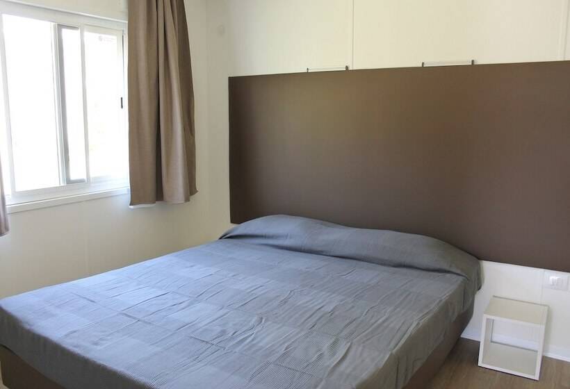 فندق Camping Porto Srl