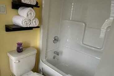 هتل Hôtel Les Quatre Bonheurs