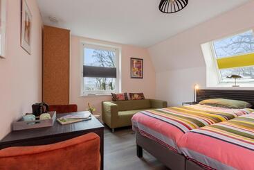 تختخواب و صبحانه Lowlander Bnb