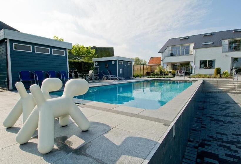 هتل Guesthouse De Witte Merel Deluxe