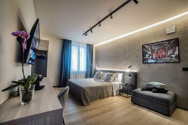 تختخواب و صبحانه Corso 84 Luxury Suites