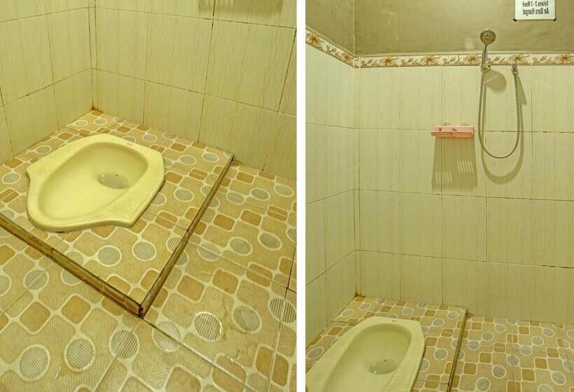 ホテル Spot On 91697 Nyaman Homestay Syariah