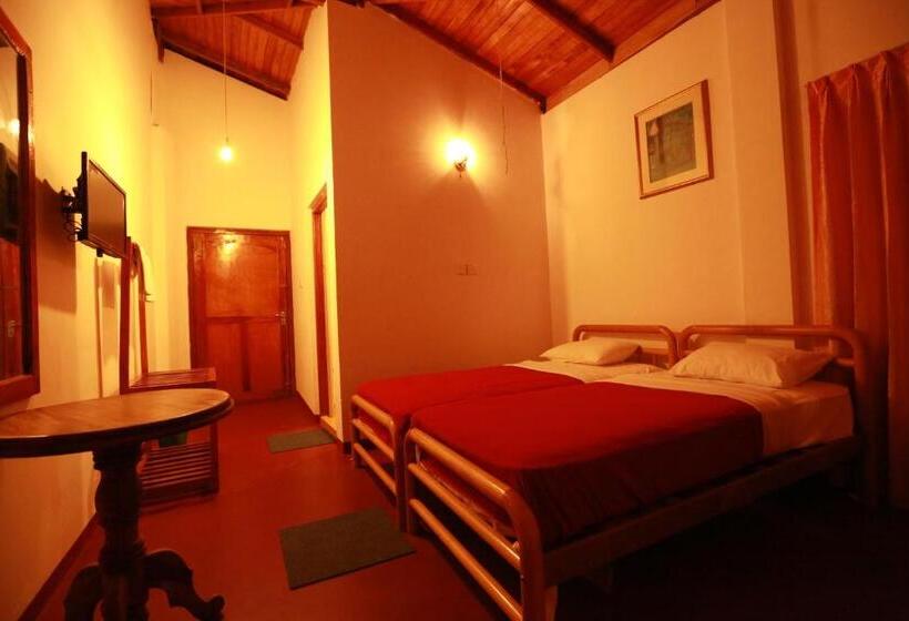 تختخواب و صبحانه Tea Garden Holiday Inn