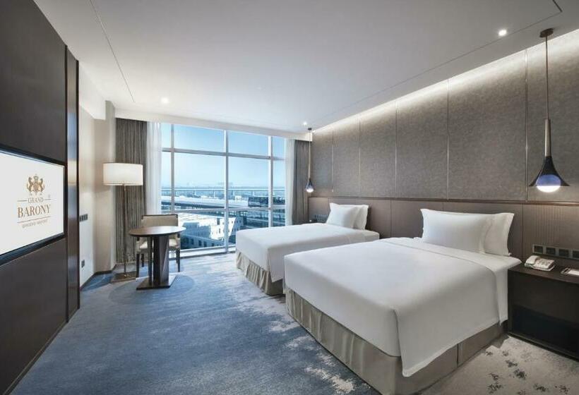 هتل Grand Barony Qingdao Airport