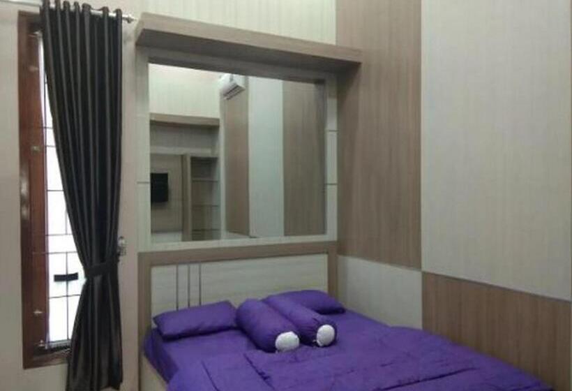 Отель Kedai Oma Syariah Mitra Reddoorz