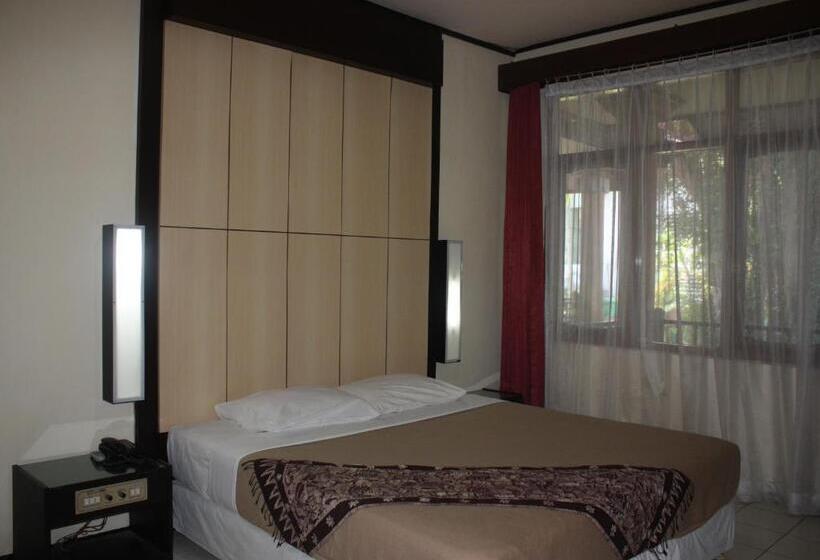 فندق Puri Naga Beachfront Cottages