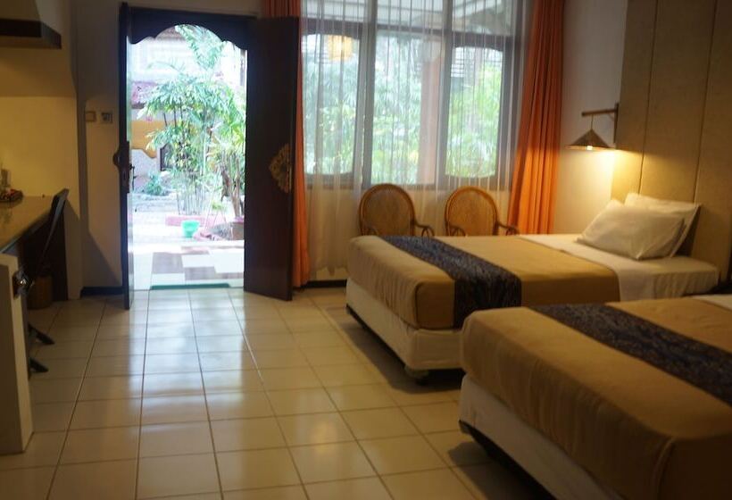 فندق Puri Naga Beachfront Cottages