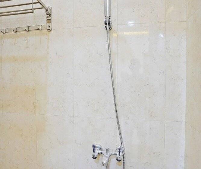 Отель Kanggo Riko Family Homestay Mitra Reddoorz