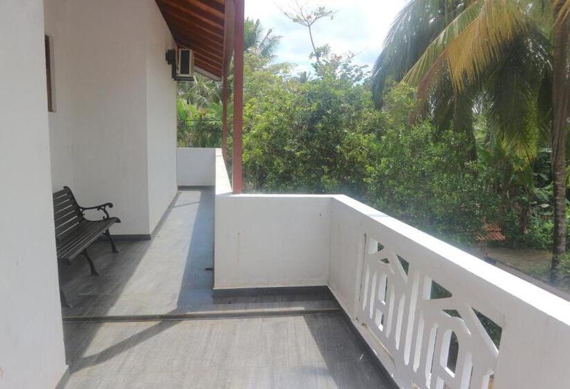 تختخواب و صبحانه Mango Tree House