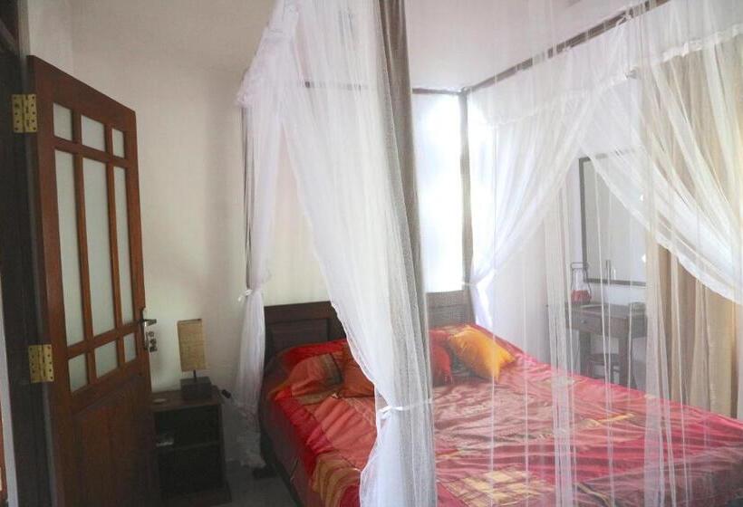 تختخواب و صبحانه Mango Tree House