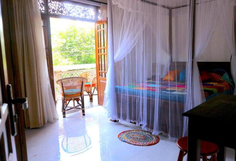 تختخواب و صبحانه Mango Tree House