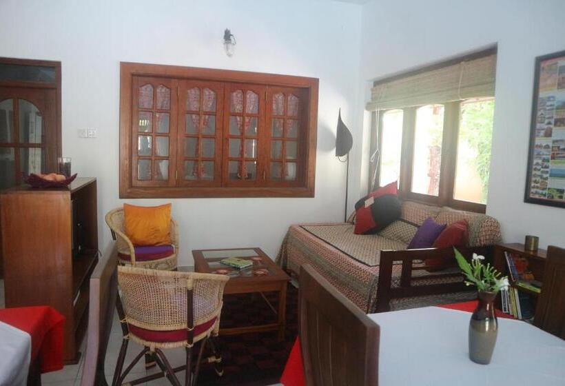 تختخواب و صبحانه Mango Tree House
