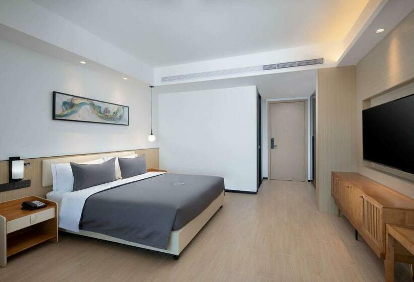 Отель Ramada Encore By Wyndham Jiusuo Downtown