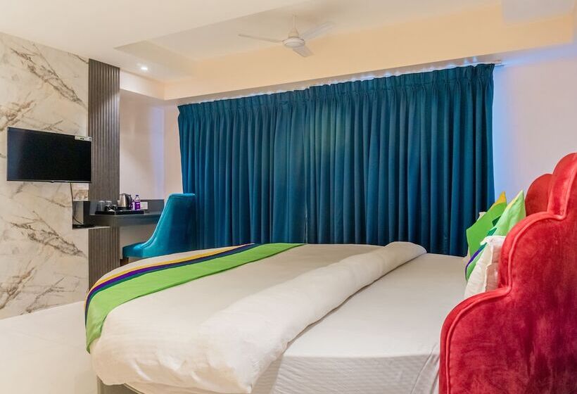 בית מלון כפרי Treebo Blossom   Viman Nagar