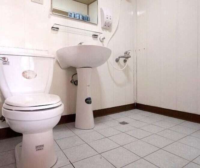 تختخواب و صبحانه He Feng Homestay