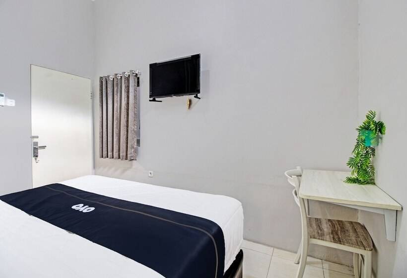 Отель Capital O 92250 Hall & Guesthouse Kowapi Syariah