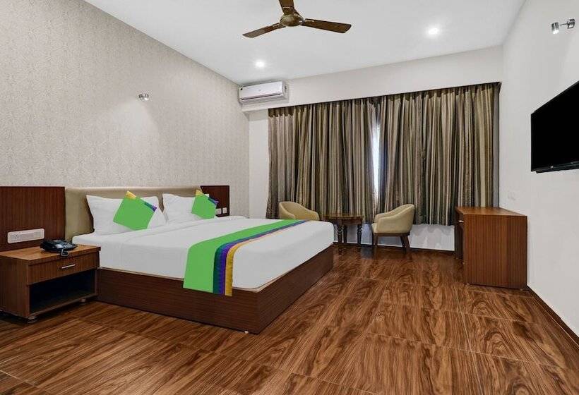 Отель Treebo Trend Shri Aprameya Resort