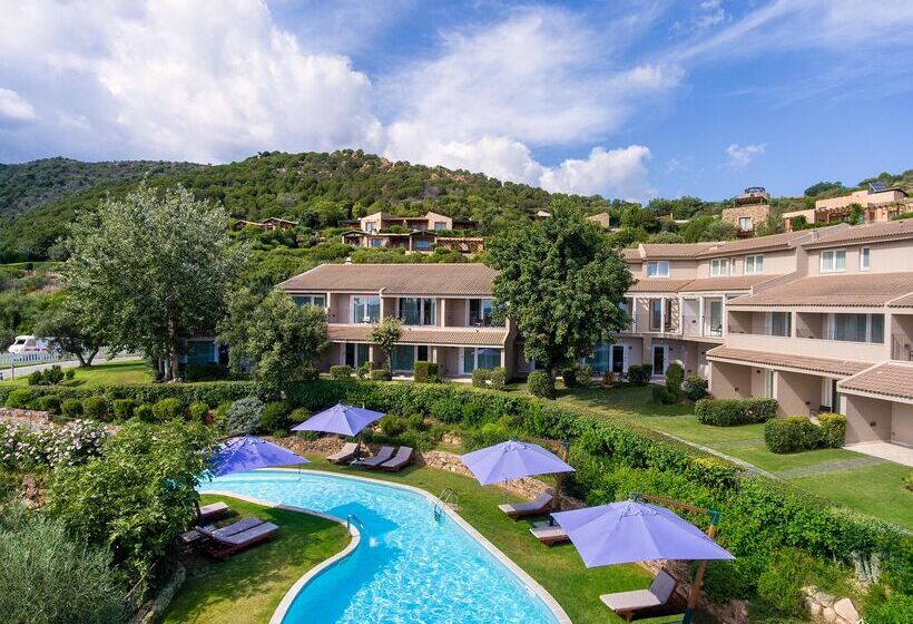 Отель Chia Laguna Resort - Spazio Oasi