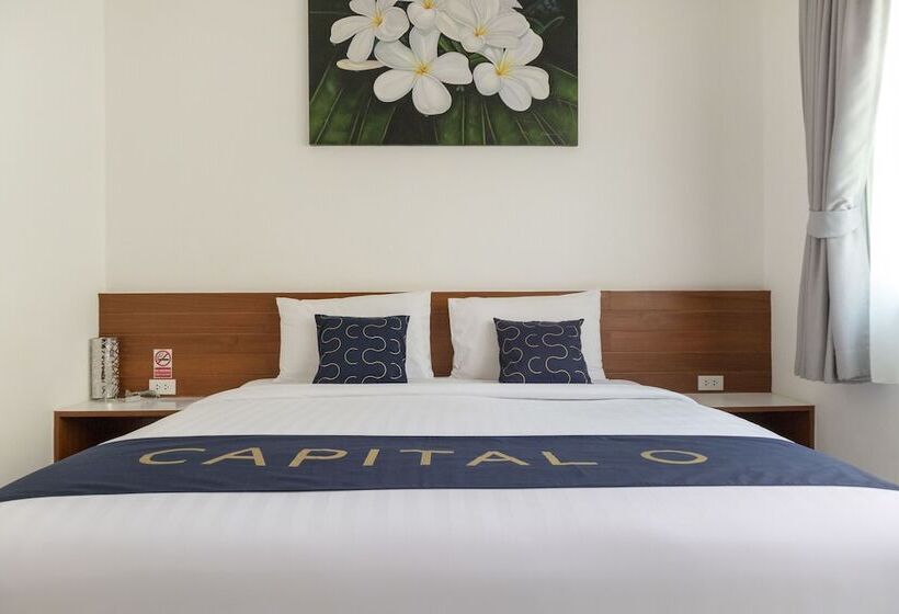 Отель Capital O847 Orchid Garden Villa